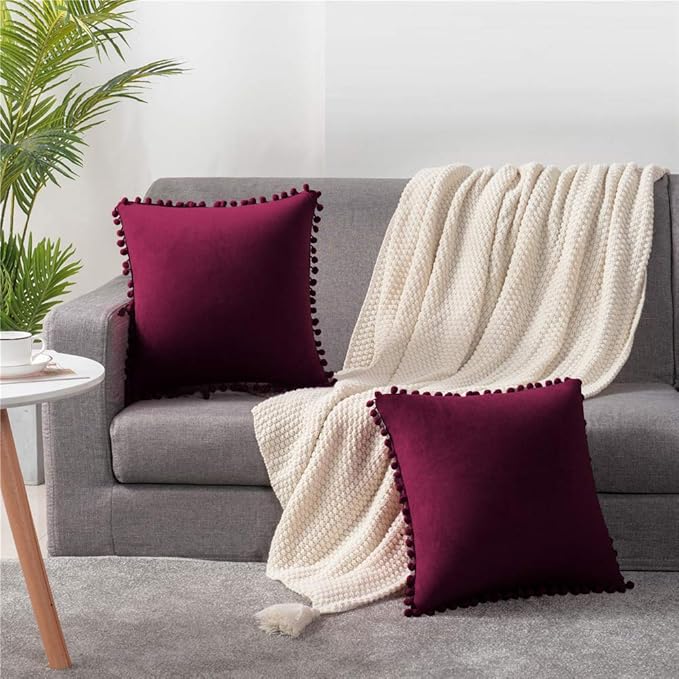 DEZENE Throw Pillow Covers 22x22 Wine Red: 2 Pack Cozy Soft Pom-poms Velvet Square Decorative Pillow Cases for Farmhouse Home Decor