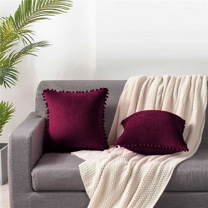 DEZENE Throw Pillow Covers 22x22 Wine Red: 2 Pack Cozy Soft Pom-poms Velvet Square Decorative Pillow Cases for Farmhouse Home Decor