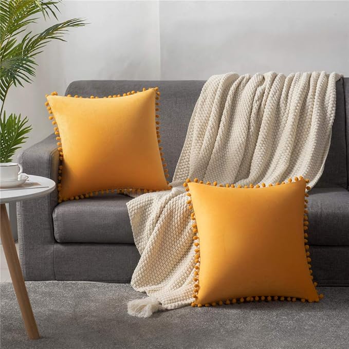 DEZENE Couch Pillow Covers 20x20 Golden Yellow: 2 Pack Cozy Soft Pom-poms Velvet Square Throw Pillow Cases for Farmhouse Home Decor