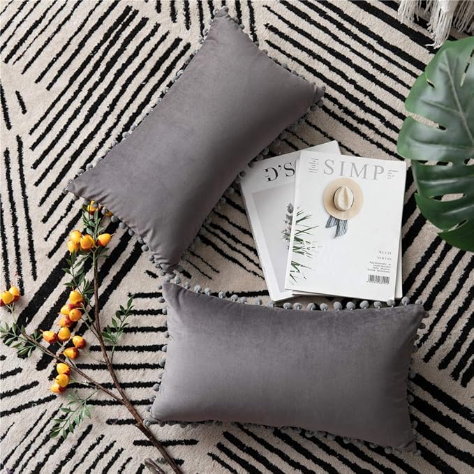 DEZENE Throw Pillow Covers 12x20 Dark-Grey: 2 Pack Cozy Soft Pom-poms Velvet Rectangular Decorative Pillow Cases for Farmhouse Home Decor