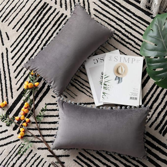 DEZENE Throw Pillow Covers 12x20 Dark-Grey: 2 Pack Cozy Soft Pom-poms Velvet Rectangular Decorative Pillow Cases for Farmhouse Home Decor